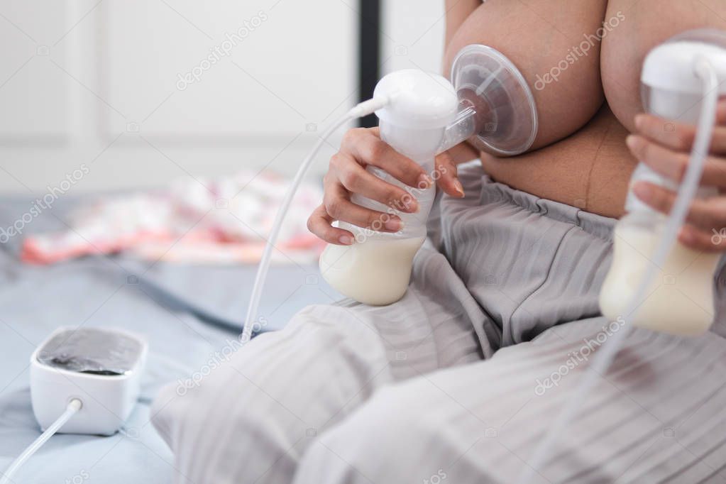 Intruder drinks breast milk from helpless image