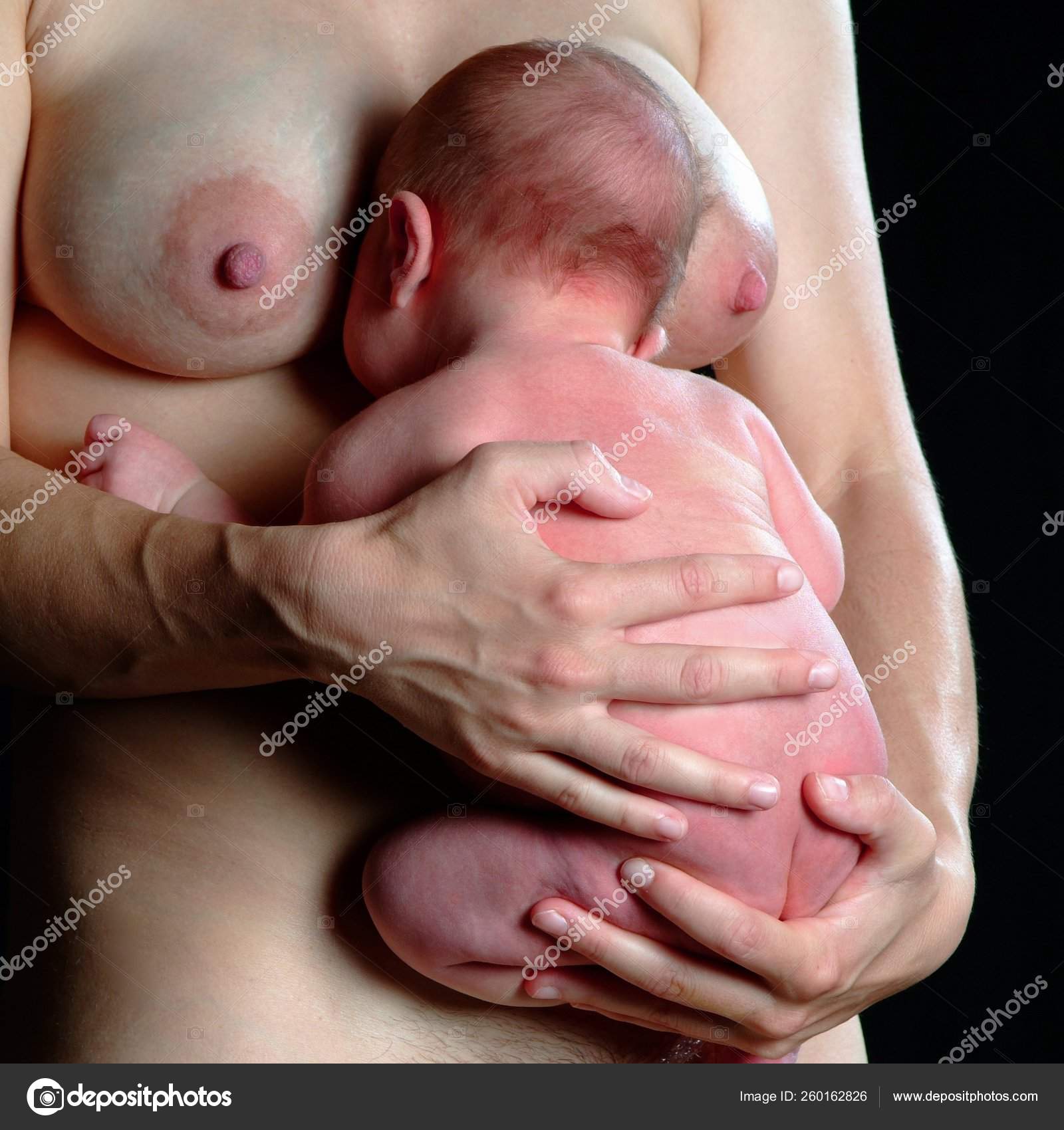 Nude women breastfeeding