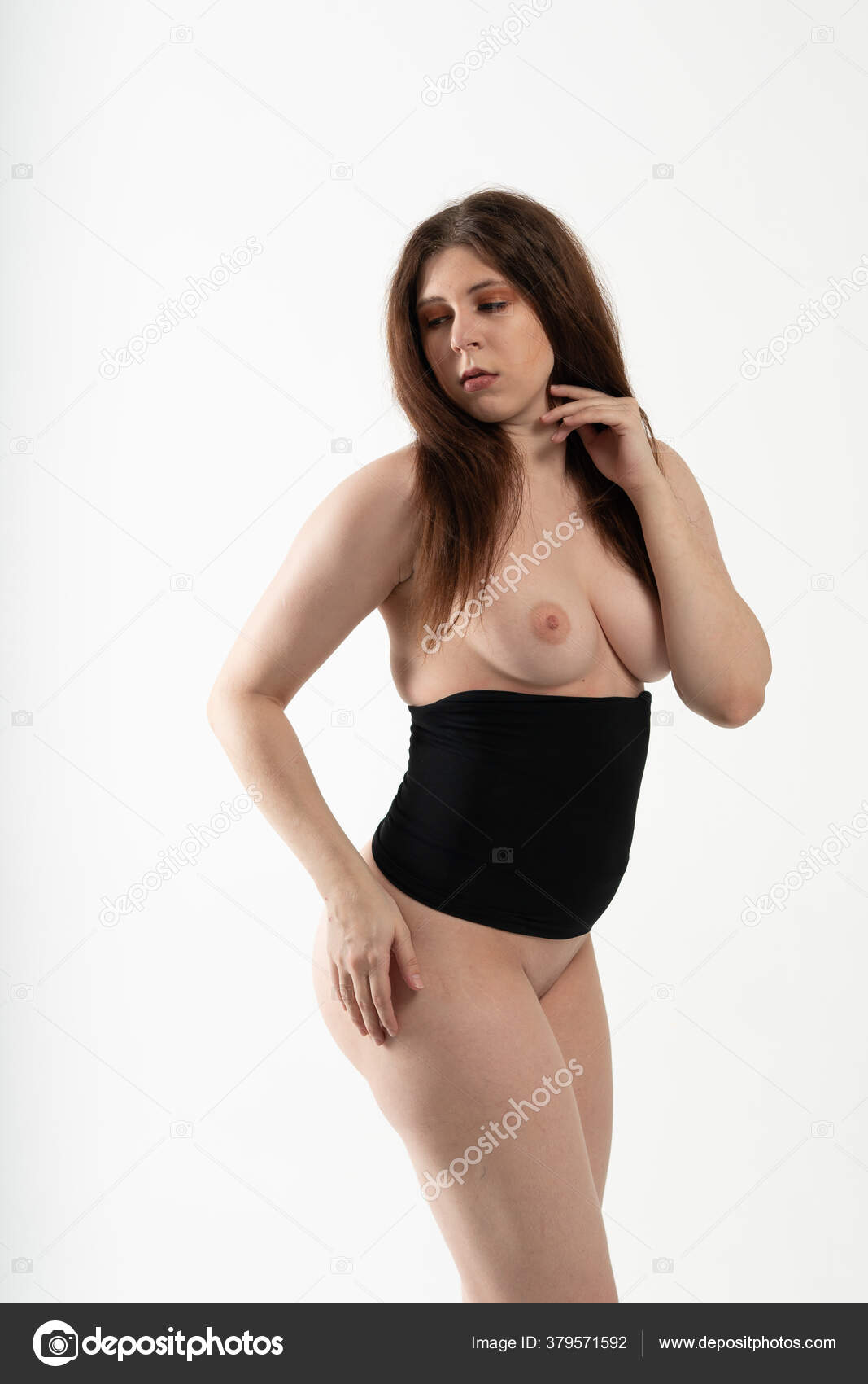 https://st4n.depositphotos.com/10086424/37957/i/1600/depositphotos_379571592-stock-photo-young-beautiful-girl-posing-nude.jpg