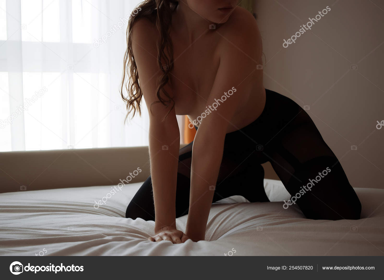 https://st4n.depositphotos.com/5034975/25450/i/1600/depositphotos_254507820-stock-photo-young-sensual-naked-woman-posing.jpg
